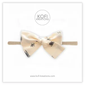 Poto Hand-Tied Hair Bow